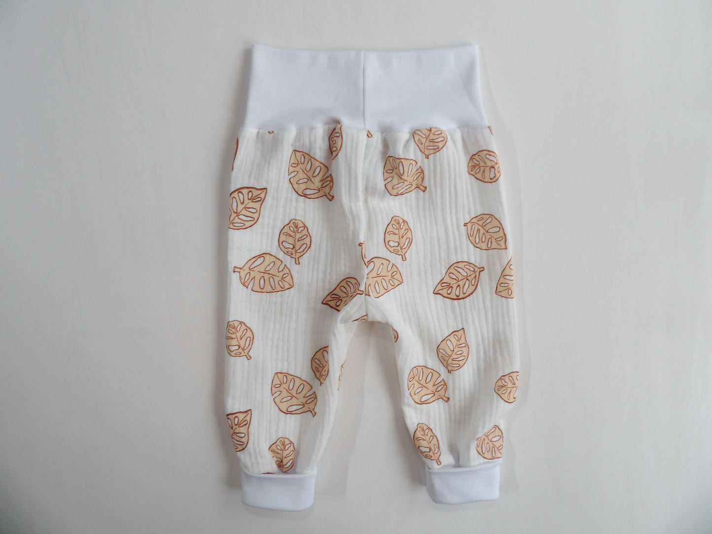 Grow-with-me pants in Muslin Terracotta Leaves - size 68