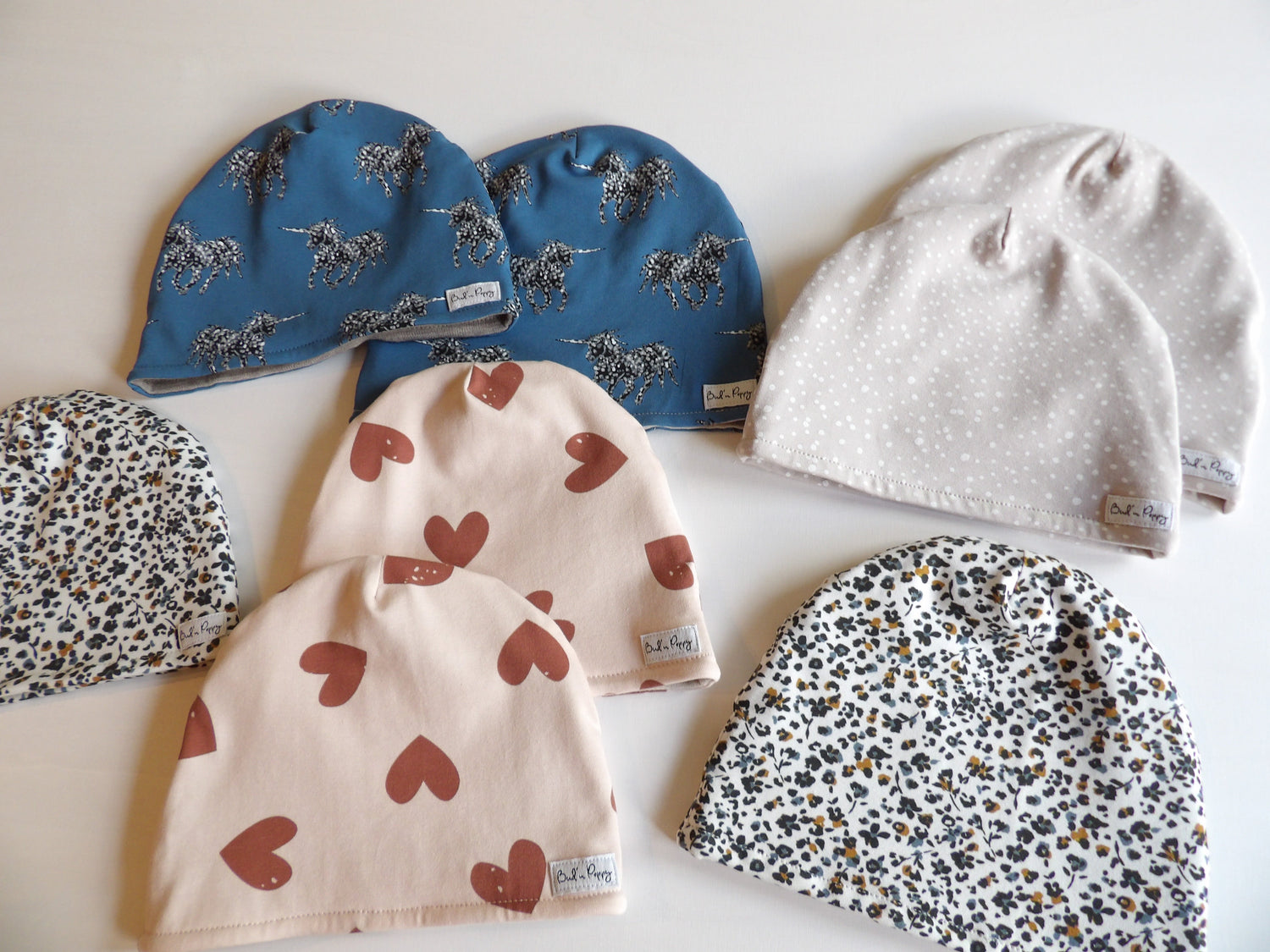 Fodrade barnmössor i merinoull