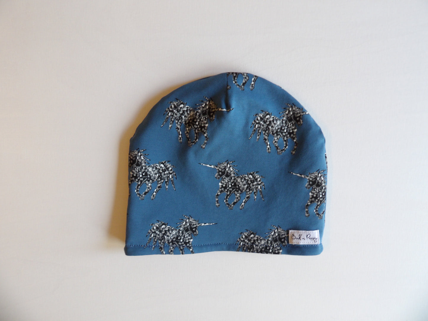 Fodrad barnmössa i merinoull, Blue Unicorn, storlek 48/50 & 50/52 - Bud´s Wardrobe