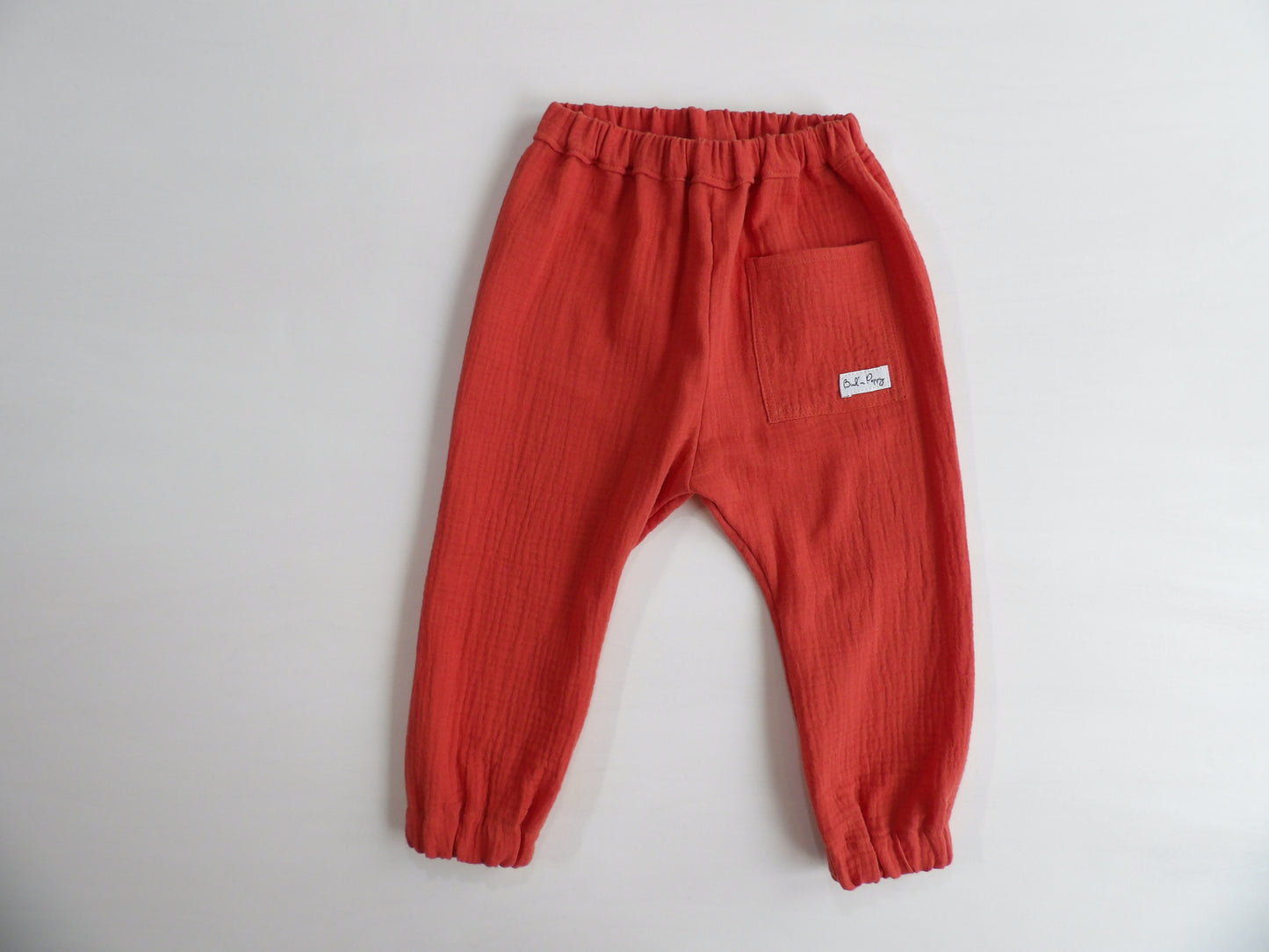 Resårbyxa i Muslin Orange Dusk - storlek 86