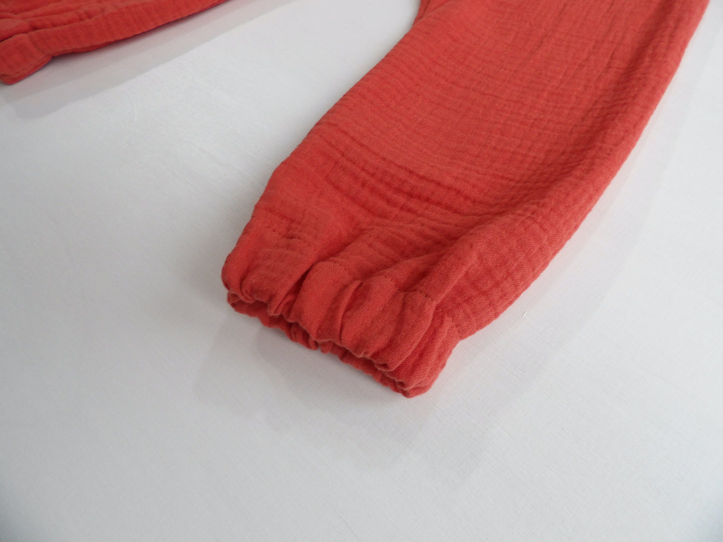 Resårbyxa i Muslin Orange Dusk - storlek 86
