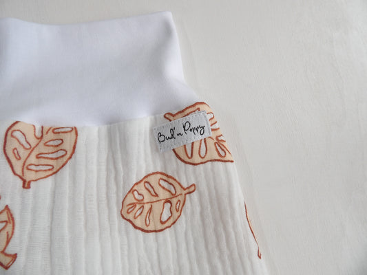 Grow-with-me pants in Muslin Terracotta Leaves - size 68