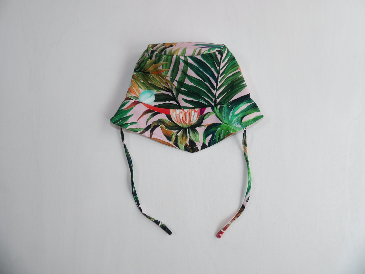 Solhatt i Trikå Tropical Garden - storlek 48/50 (ca 10-18 mån)