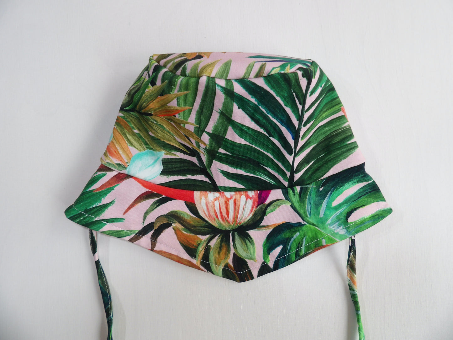 Solhatt i Trikå Tropical Garden - storlek 48/50 (ca 10-18 mån)